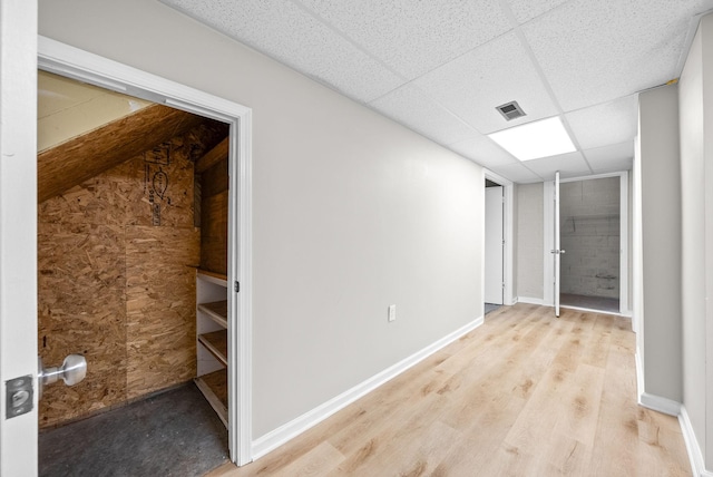 938 Merritt Lewis Ln, Clarksville, TN 37042 - corridor with a drop ceiling, light wood-style floors, and baseboards