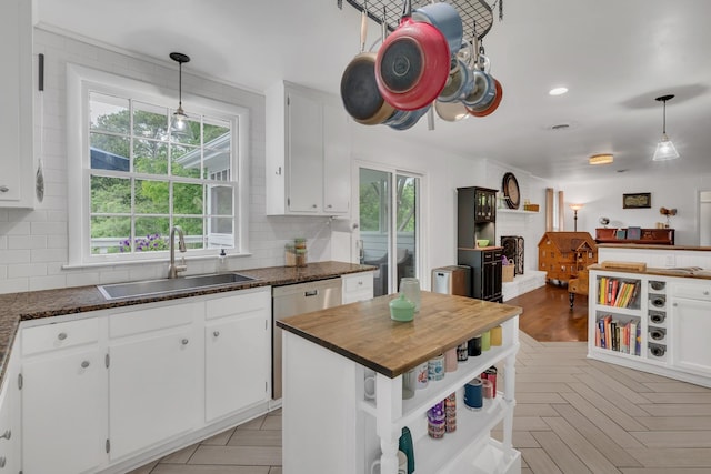 1033 Percy Warner Blvd, Nashville, TN 37205 - kitchen featuring a sink, backsplash, white cabinets, and recessed lighting