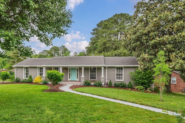 1033 Percy Warner Blvd, Nashville, TN 37205 - single story home featuring a front yard, brick siding, and covered porch