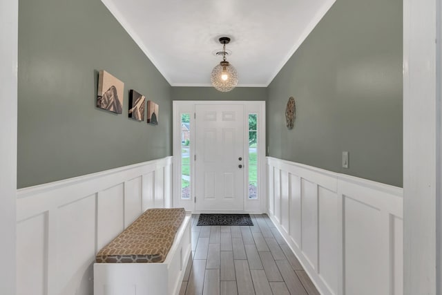 1033 Percy Warner Blvd, Nashville, TN 37205 - foyer entrance featuring a decorative wall, a wainscoted wall, crown molding, and dark wood-style flooring