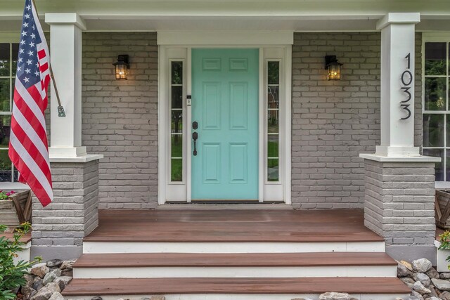 1033 Percy Warner Blvd, Nashville, TN 37205 - doorway to property featuring covered porch and brick siding