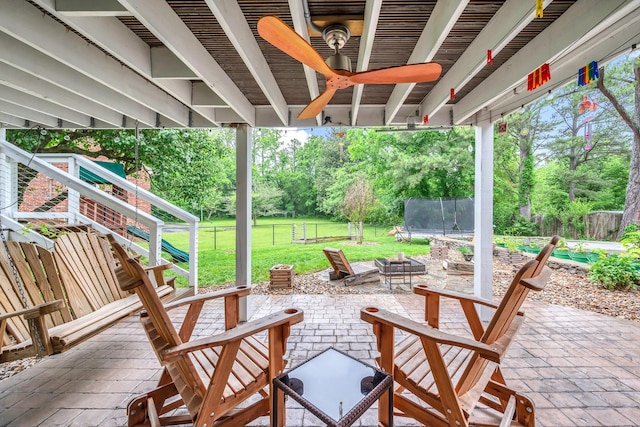 1033 Percy Warner Blvd, Nashville, TN 37205 - view of patio / terrace with ceiling fan, a trampoline, and view of wooded area