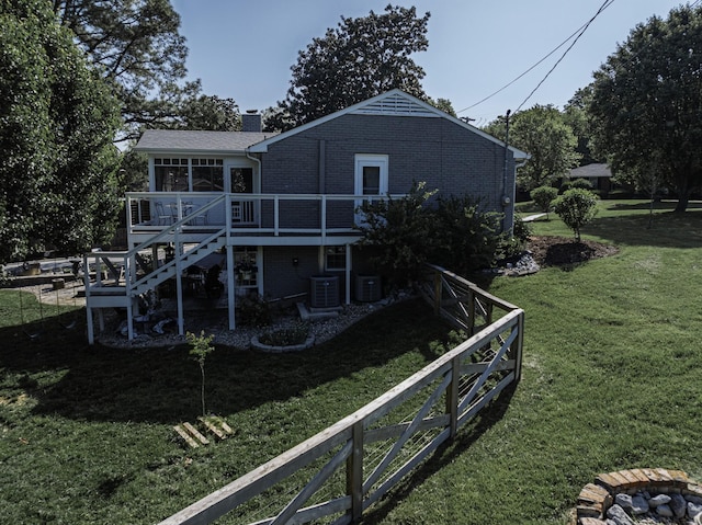 1033 Percy Warner Blvd, Nashville, TN 37205 - rear view of property featuring brick siding, a deck, a yard, stairs, and a chimney