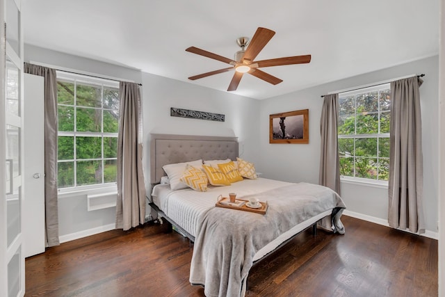 1033 Percy Warner Blvd, Nashville, TN 37205 - bedroom with multiple windows and dark wood-type flooring
