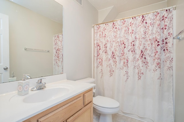 1543 James Gafford Dr, La Vergne, TN 37086 - bathroom with toilet, vanity, a shower with curtain, and tile patterned flooring