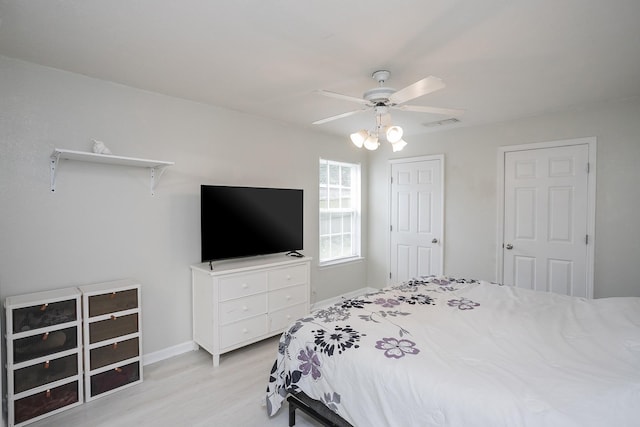 1543 James Gafford Dr, La Vergne, TN 37086 - bedroom featuring light wood-style floors, baseboards, and ceiling fan