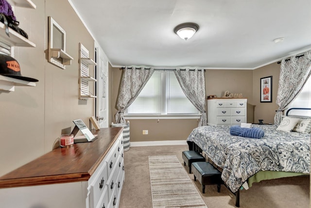 304 5th Ave, Columbia, TN 38401 - bedroom with light colored carpet, baseboards, and crown molding