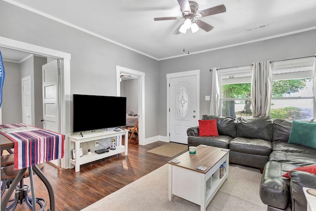 304 5th Ave, Columbia, TN 38401 - living area with wood finished floors, ornamental molding, a ceiling fan, and baseboards
