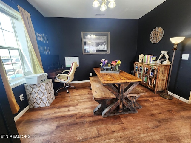 office area featuring wood finished floors and baseboards