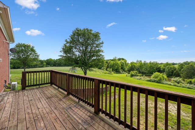 122 Windcrest Dr, Hohenwald, TN 38462 - deck featuring a yard