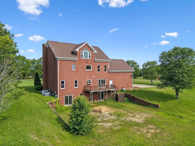 122 Windcrest Dr, Hohenwald, TN 38462 - back of house with a deck, a yard, brick siding, and stairway