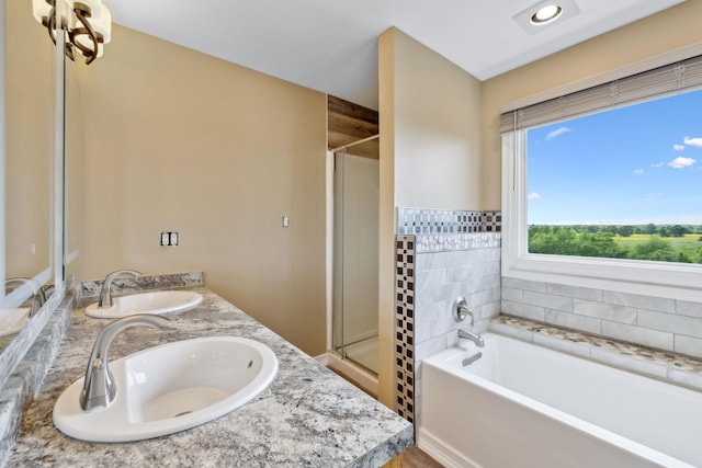 122 Windcrest Dr, Hohenwald, TN 38462 - full bath featuring a stall shower, a garden tub, and double vanity