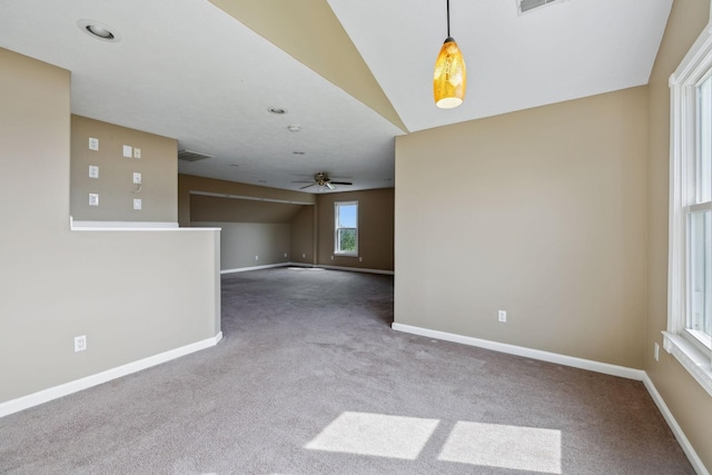 122 Windcrest Dr, Hohenwald, TN 38462 - unfurnished room with carpet flooring, vaulted ceiling, ceiling fan, and baseboards