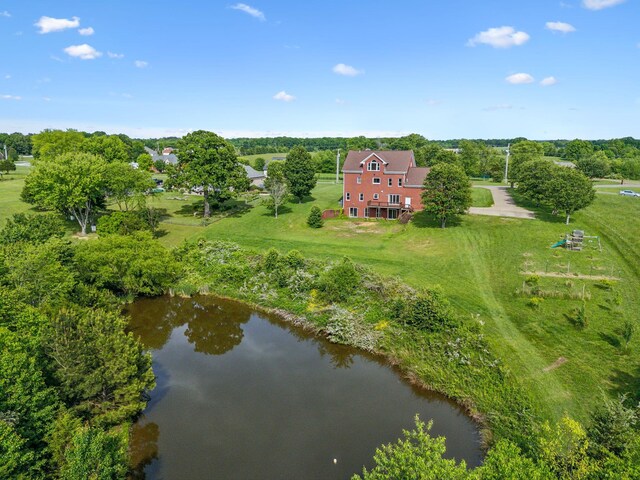 122 Windcrest Dr, Hohenwald, TN 38462 - view from above of property featuring a large body of water and a tree filled landscape