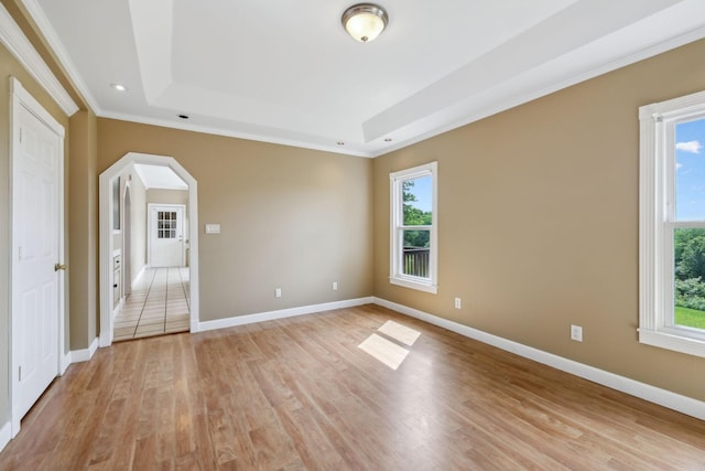 122 Windcrest Dr, Hohenwald, TN 38462 - empty room featuring a tray ceiling, crown molding, light wood finished floors, baseboards, and recessed lighting