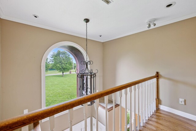 122 Windcrest Dr, Hohenwald, TN 38462 - corridor with crown molding, baseboards, a chandelier, and light wood-style floors