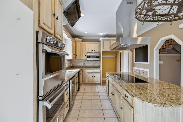 122 Windcrest Dr, Hohenwald, TN 38462 - kitchen featuring stainless steel appliances, island range hood, light brown cabinetry, crown molding, and tasteful backsplash