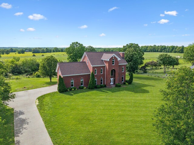 122 Windcrest Dr, Hohenwald, TN 38462 - view of front of property with a front lawn, concrete driveway, and brick siding