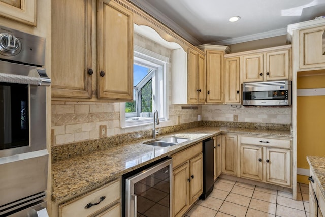 122 Windcrest Dr, Hohenwald, TN 38462 - kitchen with wine cooler, stainless steel appliances, a sink, ornamental molding, and light brown cabinets