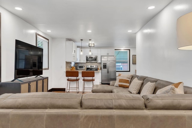 living room with recessed lighting