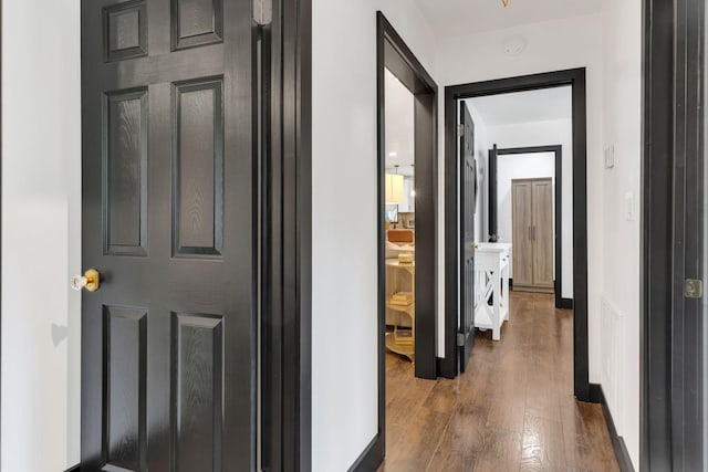 hall featuring dark wood-style floors