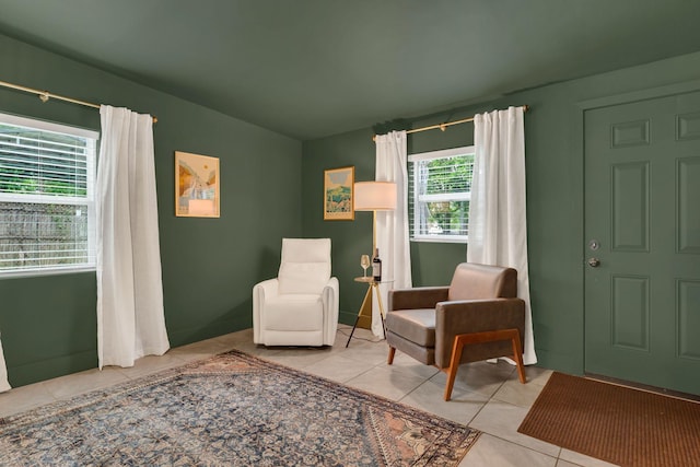 sitting room featuring tile patterned floors