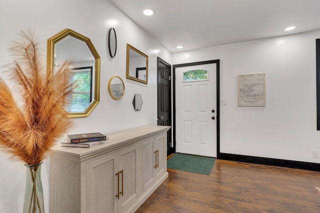 foyer featuring dark wood-style flooring and recessed lighting