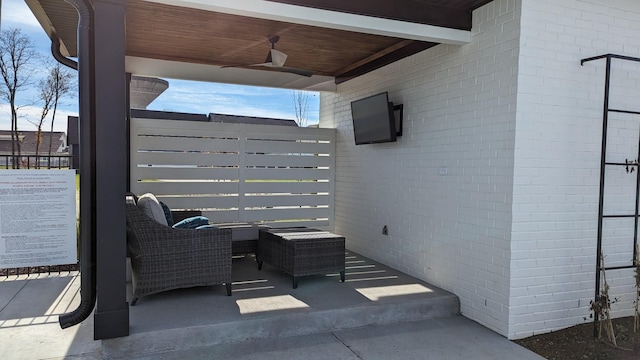view of patio / terrace featuring a ceiling fan