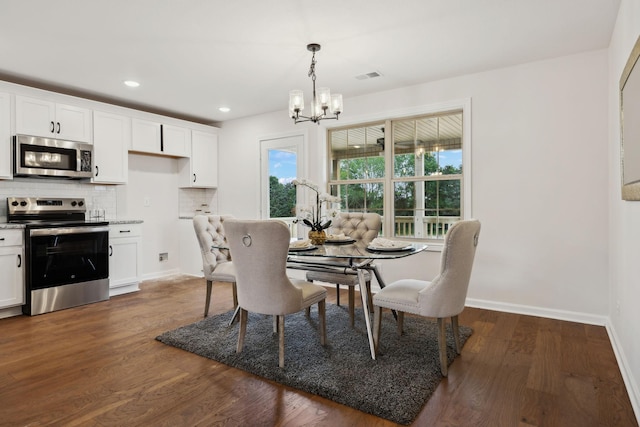 1543 Fredrick Dr, Clarksville, TN 37042 - dining area featuring a chandelier, dark wood-style flooring, and recessed lighting