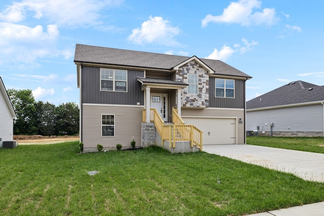 1543 Fredrick Dr, Clarksville, TN 37042 - view of front facade with driveway, a front yard, an attached garage, stone siding, and board and batten siding