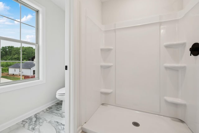 1543 Fredrick Dr, Clarksville, TN 37042 - bathroom featuring marble look tile flooring and a shower