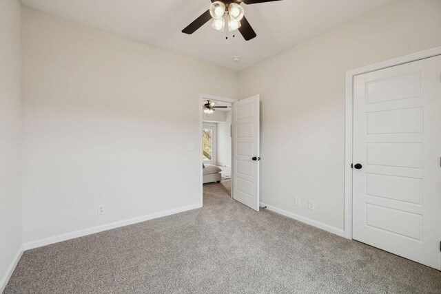 1543 Fredrick Dr, Clarksville, TN 37042 - unfurnished bedroom featuring carpet floors and a ceiling fan
