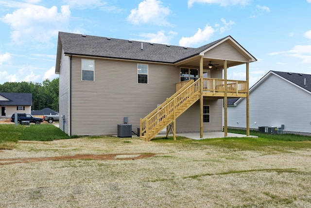 1543 Fredrick Dr, Clarksville, TN 37042 - rear view of property with a ceiling fan, stairs, a lawn, roof with shingles, and a patio area