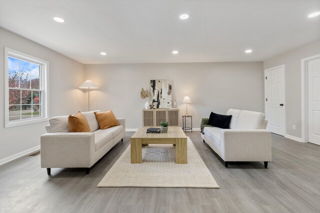 400 Log Wall Rd, Dickson, TN 37055 - living room featuring baseboards, light wood-style floors, and recessed lighting