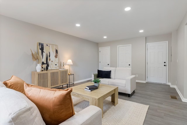 400 Log Wall Rd, Dickson, TN 37055 - living room featuring baseboards, recessed lighting, and wood finished floors