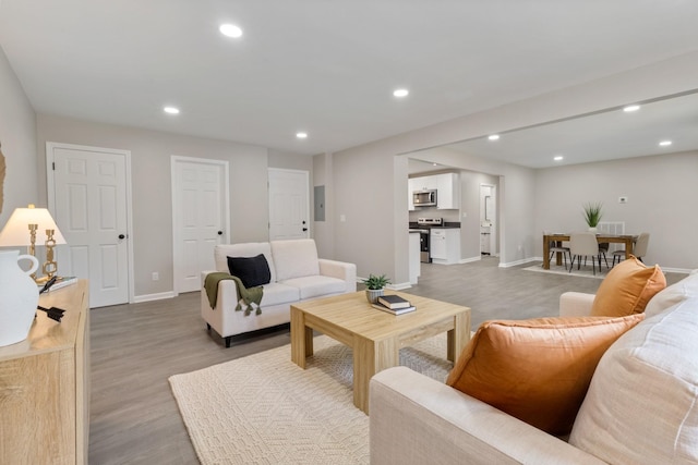 400 Log Wall Rd, Dickson, TN 37055 - living room featuring light wood finished floors, recessed lighting, baseboards, and electric panel