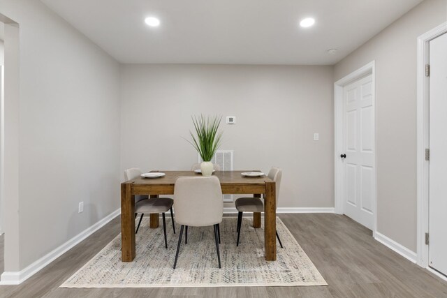 400 Log Wall Rd, Dickson, TN 37055 - dining space with wood finished floors, baseboards, and recessed lighting