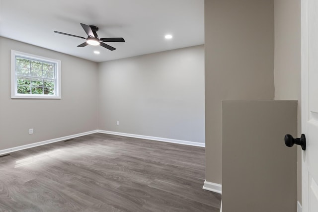 400 Log Wall Rd, Dickson, TN 37055 - spare room with a ceiling fan, dark wood-type flooring, baseboards, and recessed lighting