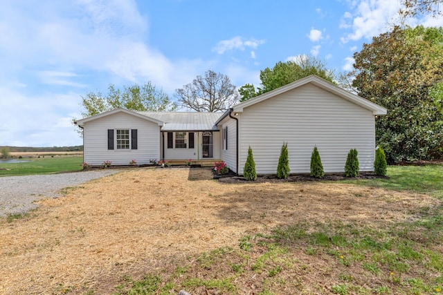 400 Log Wall Rd, Dickson, TN 37055 - ranch-style house featuring metal roof and a front lawn