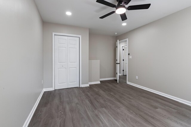 400 Log Wall Rd, Dickson, TN 37055 - unfurnished bedroom with wood finished floors, baseboards, recessed lighting, a closet, and ceiling fan