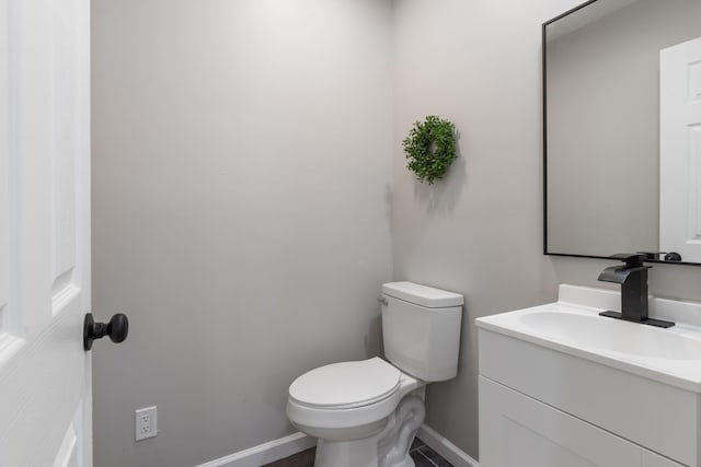 400 Log Wall Rd, Dickson, TN 37055 - bathroom with baseboards, toilet, and vanity