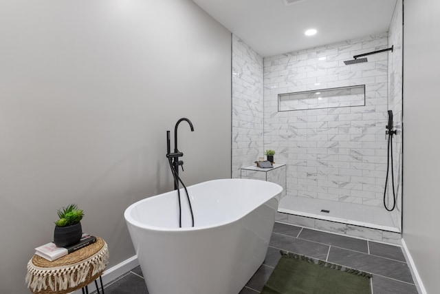 400 Log Wall Rd, Dickson, TN 37055 - full bathroom with a freestanding tub, a tile shower, baseboards, and recessed lighting