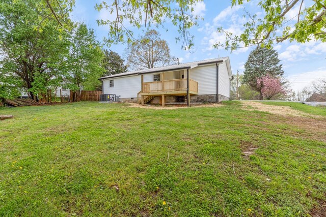 400 Log Wall Rd, Dickson, TN 37055 - back of property with a wooden deck