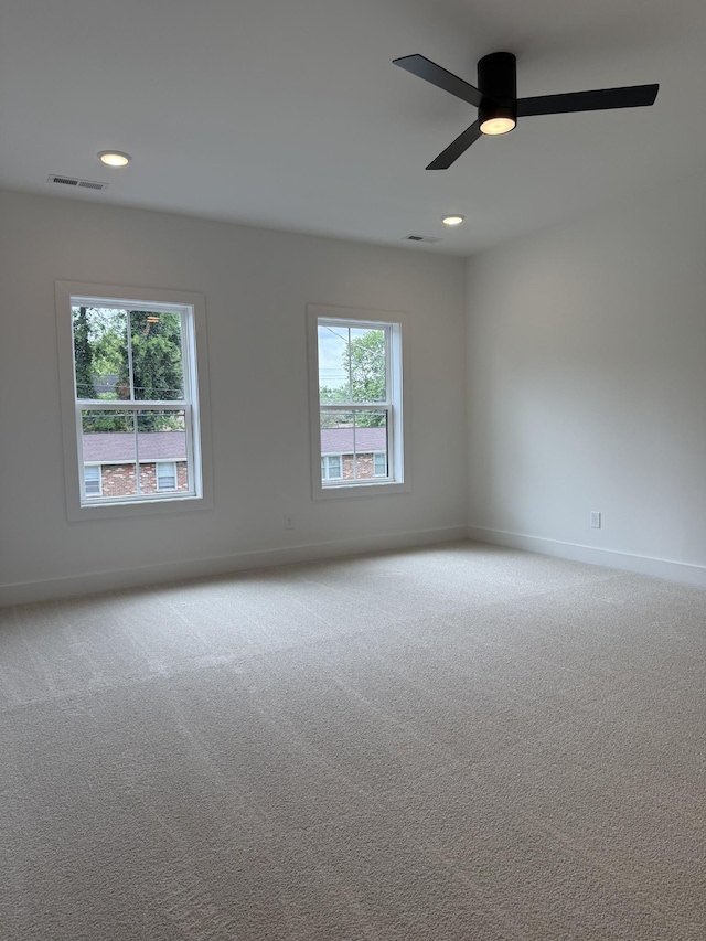 unfurnished room with carpet, baseboards, ceiling fan, and recessed lighting