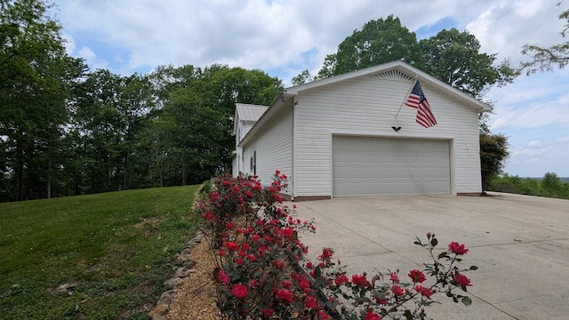 460 Mate Allen Rd, Gainesboro, TN 38562 - view of home's exterior with metal roof, a lawn, and concrete driveway