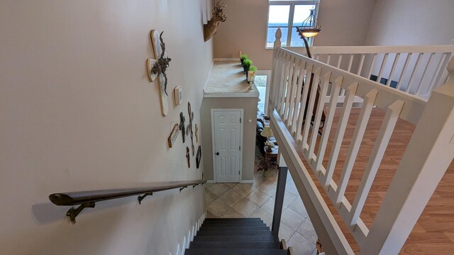 460 Mate Allen Rd, Gainesboro, TN 38562 - stairs featuring a towering ceiling and tile patterned floors