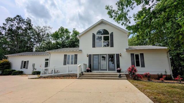 460 Mate Allen Rd, Gainesboro, TN 38562 - traditional-style home with metal roof and french doors