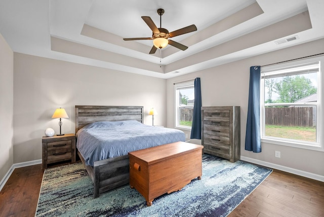 805 Waldon Ct, Clarksville, TN 37042 - bedroom with a tray ceiling, baseboards, wood finished floors, and ceiling fan