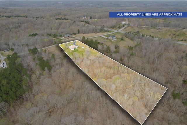 3337 Tarsus Rd, Palmyra, TN 37142 - aerial overview of property's location featuring property parcel outlined and a forest