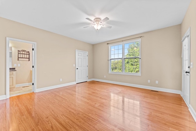 3337 Tarsus Rd, Palmyra, TN 37142 - empty room with ceiling fan and light wood-style flooring